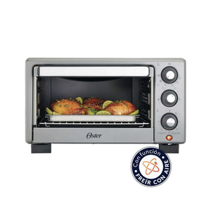 Horno aire OSTER 17L cocinando alimentos saludables con tecnología de circulación de aire caliente.