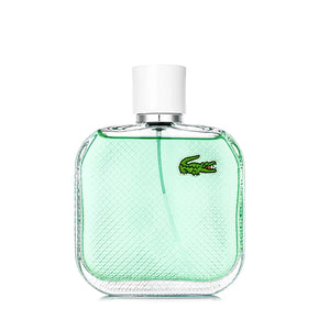 LACOSTE L1212 BLANC FRAICHE 100 ML perfume bottle with green liquid and white cap on a white background.
