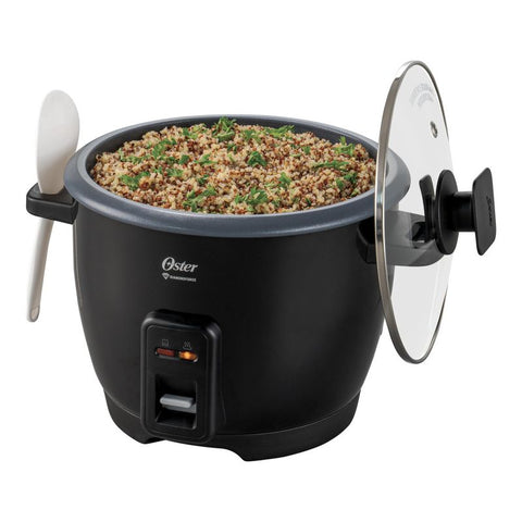 OSTER OLLA ARROCERA 7 TZS. CKSTRCB7DFBLK con recubrimiento antiadherente y quinoa cocida, tapa de vidrio y cuchara de servir