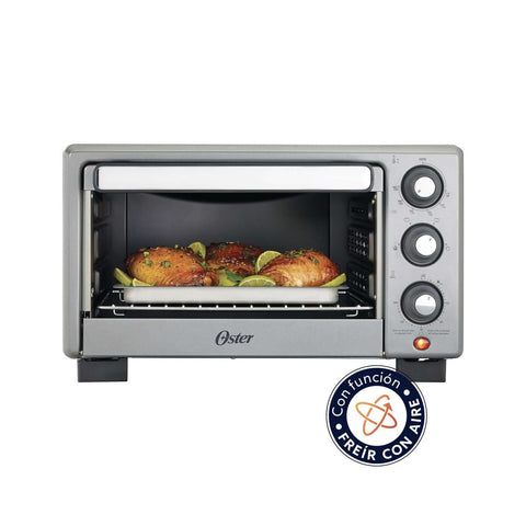 Horno aire OSTER 17L cocinando alimentos saludables con tecnología de circulación de aire caliente.