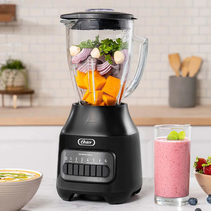 Licuadora Oster 6 Velocidades Con Motor De 800W Y Vaso De Vidrio Refractario Boroclass, Capacidad 1.5 Litros, Cuchilla De Acero Quirúrgico Y Tapa Con Cuchara Medidora De 60Ml.