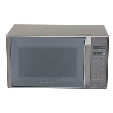 Microondas Frigidaire 700W compacto modelo FMDO17S3GSPG color blanco, diseño elegante y funcional.