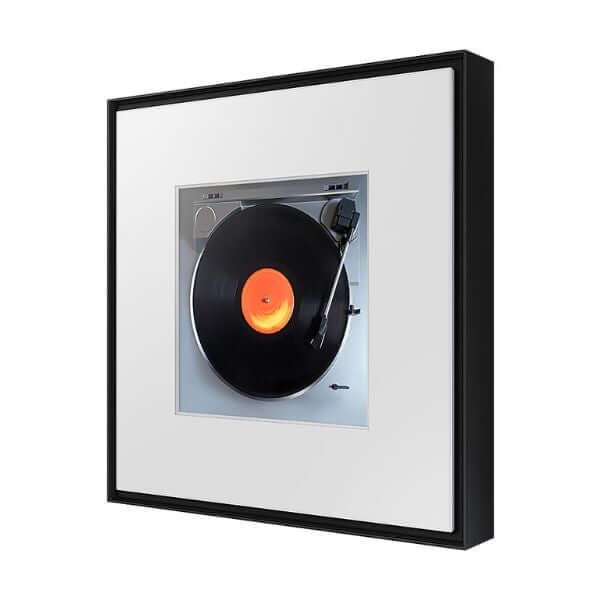 Altavoz inteligente Samsung Music Frame con diseño moderno y vinilo en el centro, ideal para la decoración y la música.