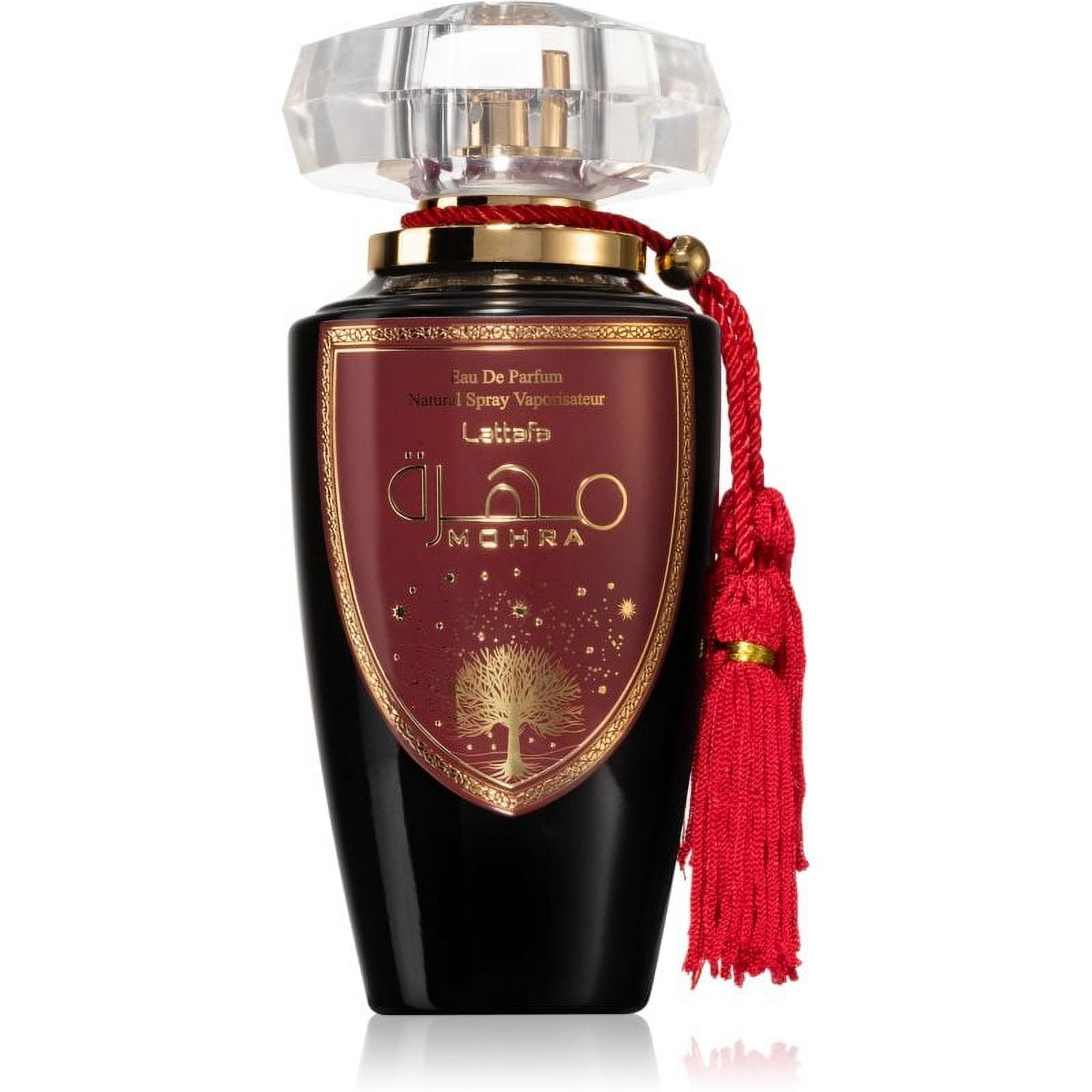 Elegant bottle of LATTAFA MOHRA 3.4OZ EDP with decorative tassel, showcasing luxurious design and branding.